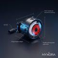 A 12V DC optical-grade lens module by NYXORA, featuring a CNC-machined aluminum housing and a red eye-patterned sealed glass lens, shown with dimension and weight labels on a dark background.